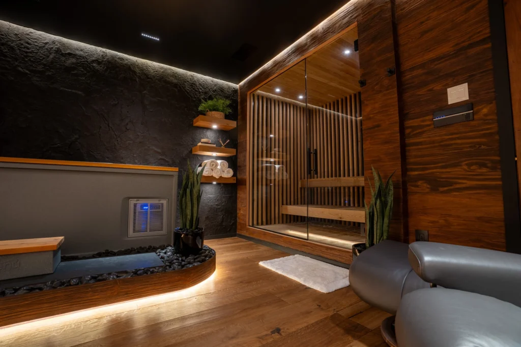 Private Westlake wellness spa with wood sauna, stone walls, and ambient lighting